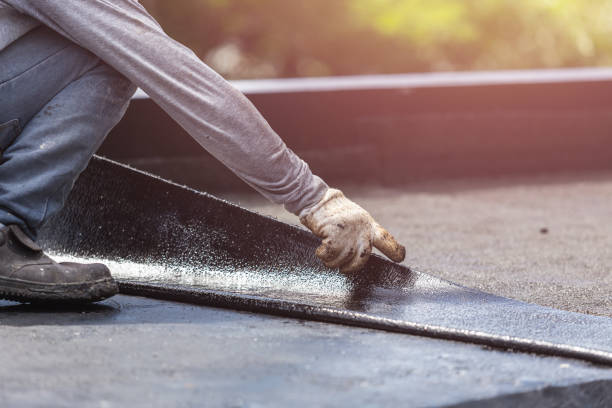 Professional Waterproofing technician working in Red Creek, NY